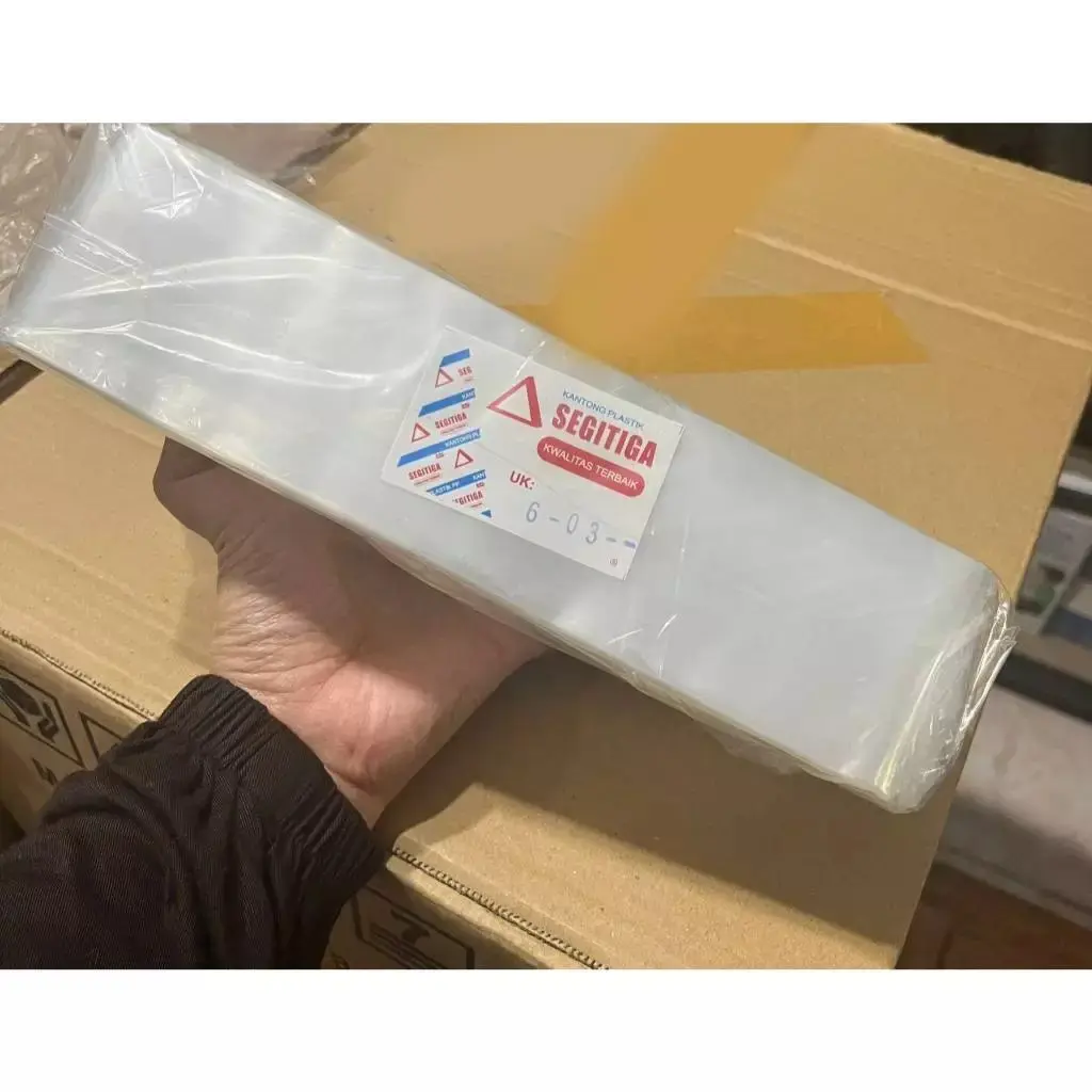 PLASTIK PP ROLL PANJANG (LEBAR 6 CM, KETEBALAN 03) UNTUK KERTAS KADO KARTON / KALENDER MEREK SEGITIGA